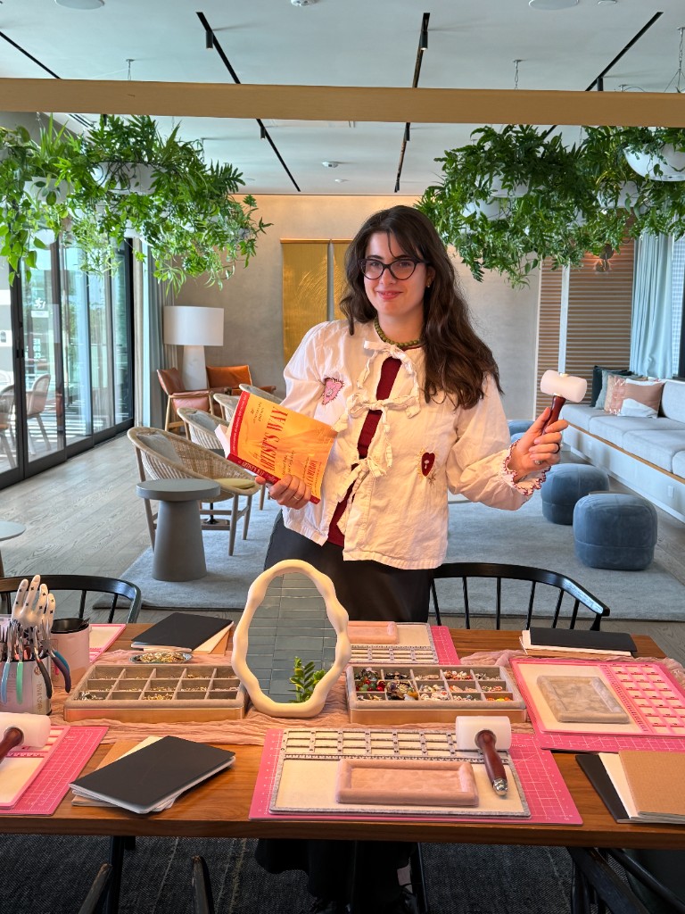 Anna at the workshop table